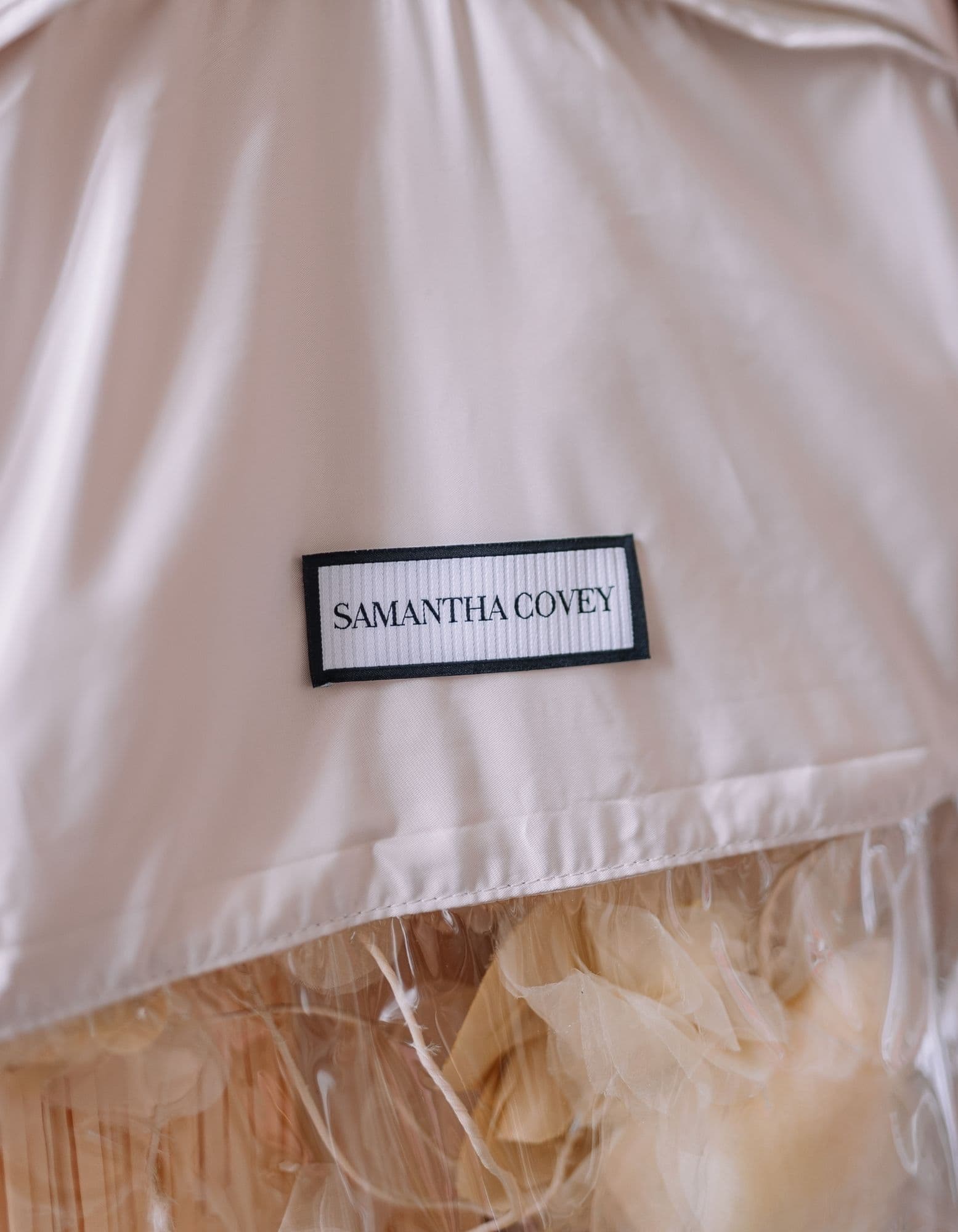The Samantha Covey garment label sewn into a finished dress.