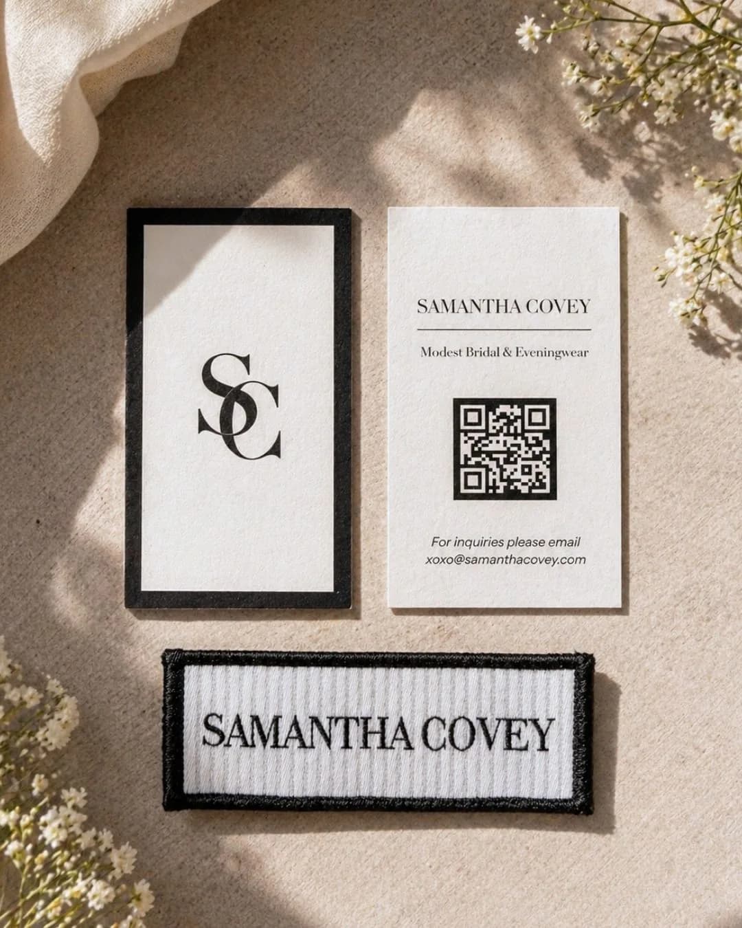 Samantha Covey brand cards and label Samantha Covey brand cards and garment label arranged with soft florals.