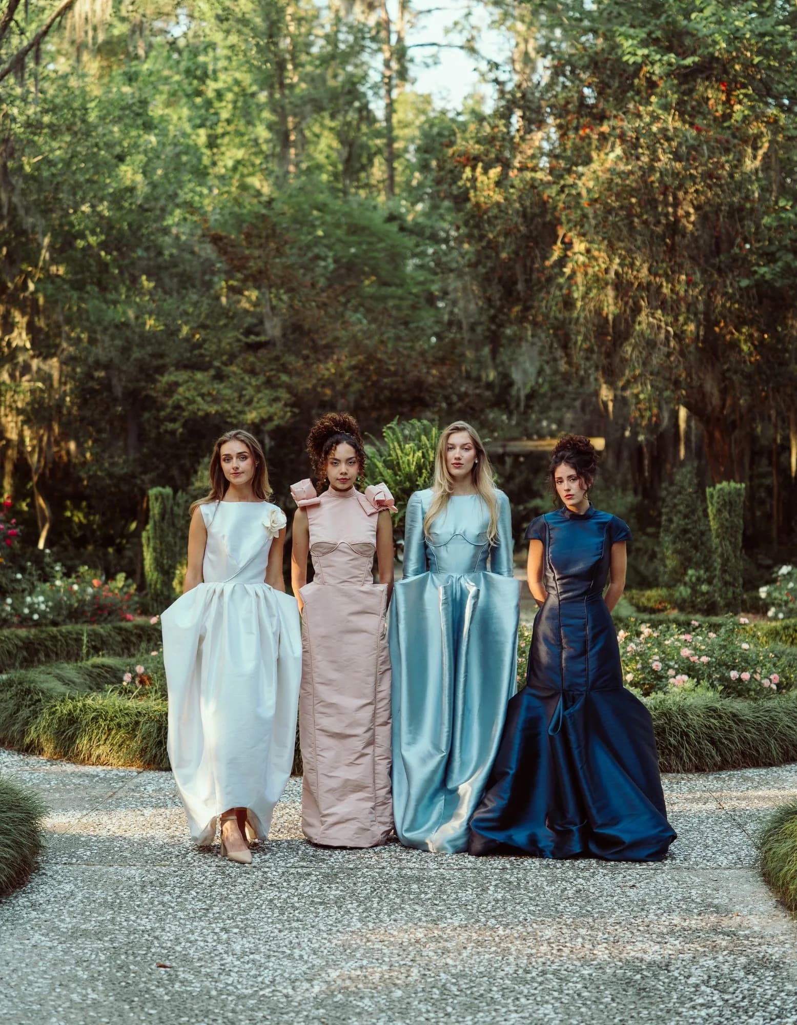 The full collection lineup in ivory, blush, powder blue, and midnight blue.