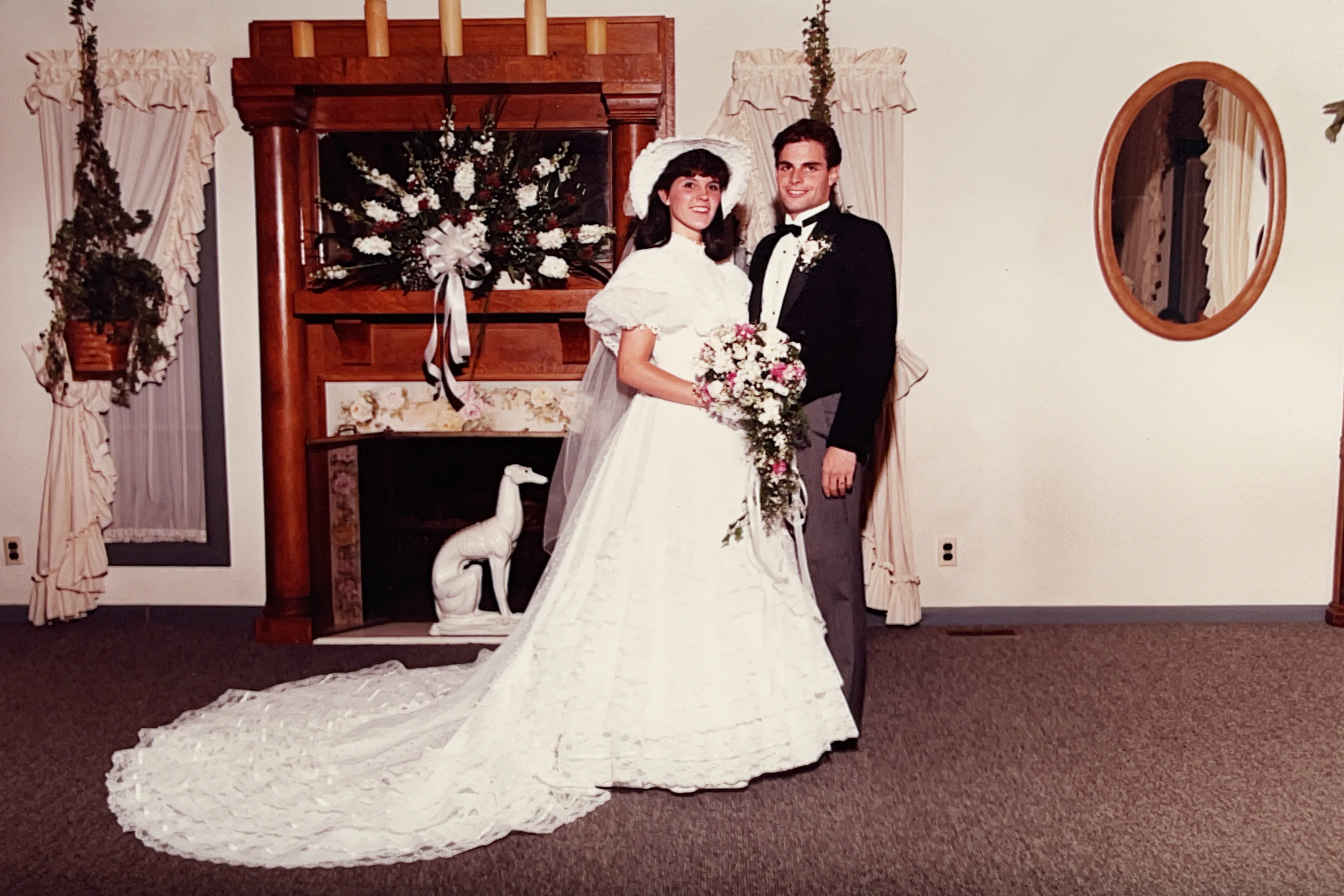 An archival 1985 wedding portrait showing Samantha Covey's parents and the original wedding dress before redesign.